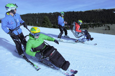 Due istruttori con due allievi in monosci